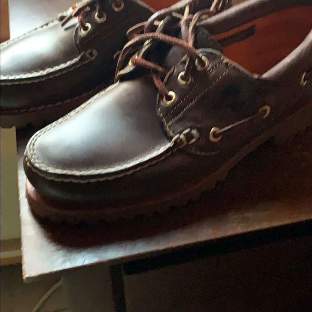 Timberland shoes and a leather fossil backpack